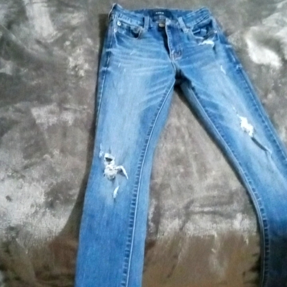Blue ripped jeans